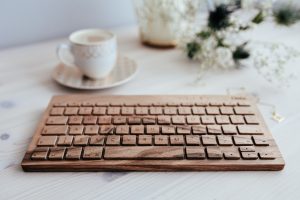 kaboompics.com_Wooden Keyboard Orée on the Wooden Desk